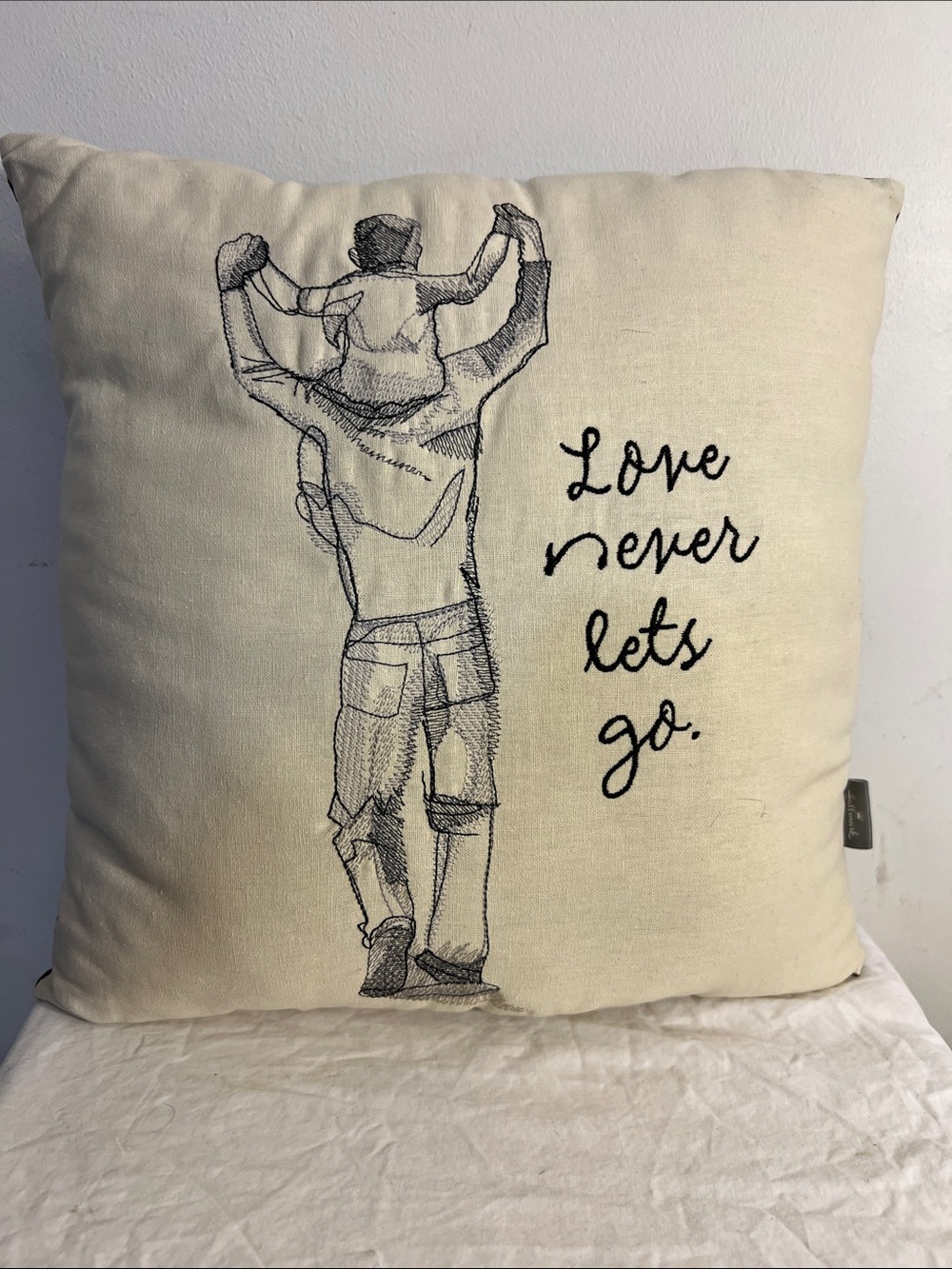 Ken Sheldon Embroidered Love Never Lets Go Cream Home Decor Pillow